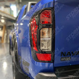 Nissan Navara Np300 2015 On Stx Tail Light Guards - Gloss Black - Pair